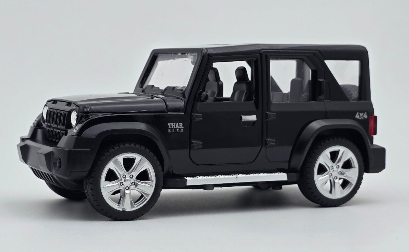 20250915_010148-Photoroom.jpg Thar Roxx Metal Diecast Car - Image 1
